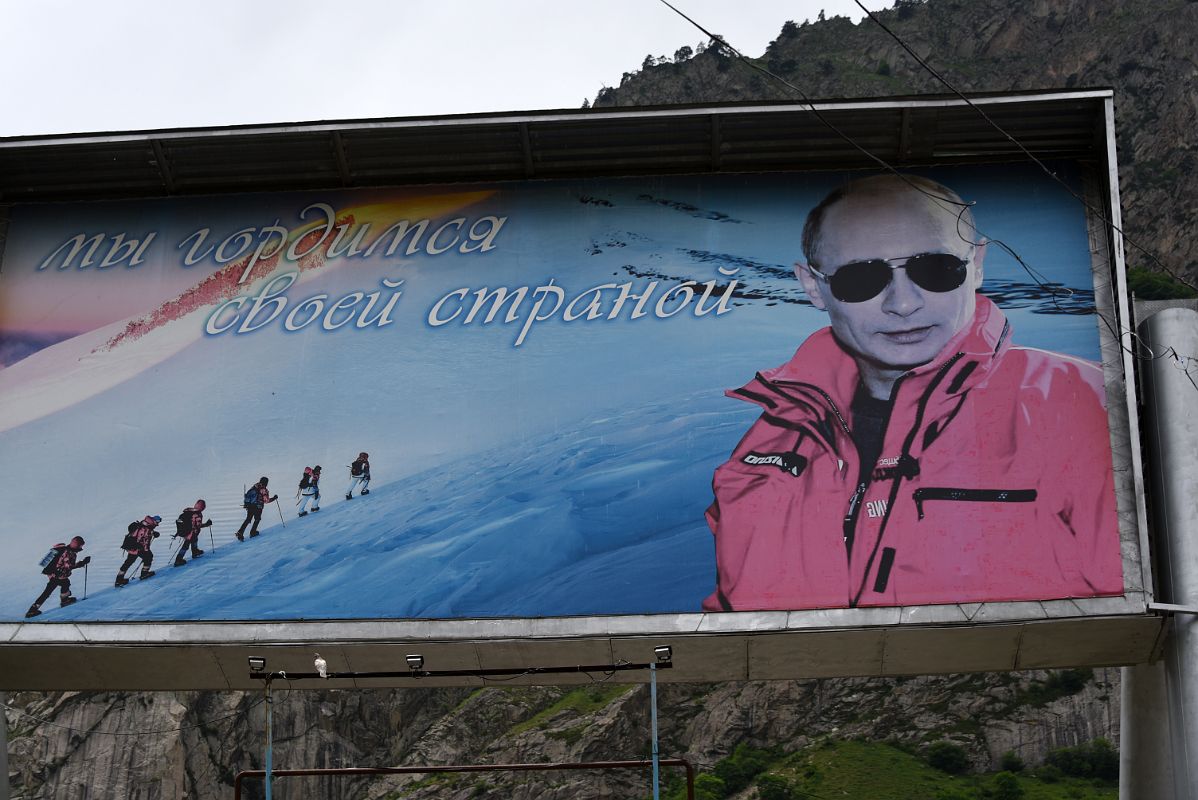 03G Billboard With Putin And Mountaineers Next To The Road On The Way To Terskol And The Mount Elbrus Climb